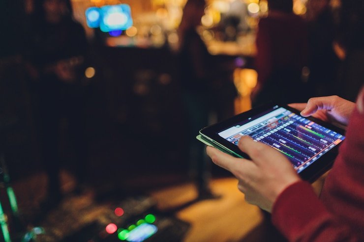 Antarmuka aplikasi terongbet di smartphone menampilkan meja dealer langsung dan menu navigasi